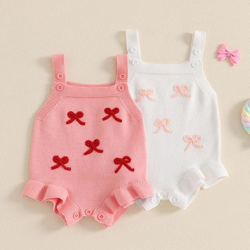 Baby birthday romper set in pink and white knit with bow details and button straps for infants