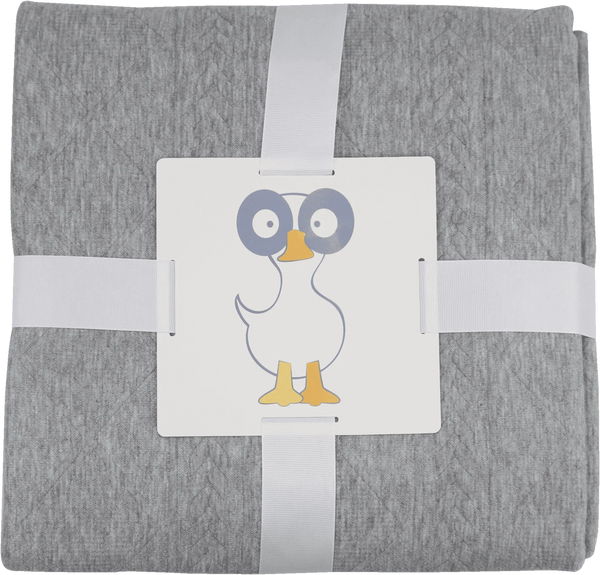Soft gray knit baby blanket made from cozy material, neatly folded with a duck illustration tag