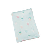 Goosewaddle blue knit baby blanket for newborns with pastel fruit pattern