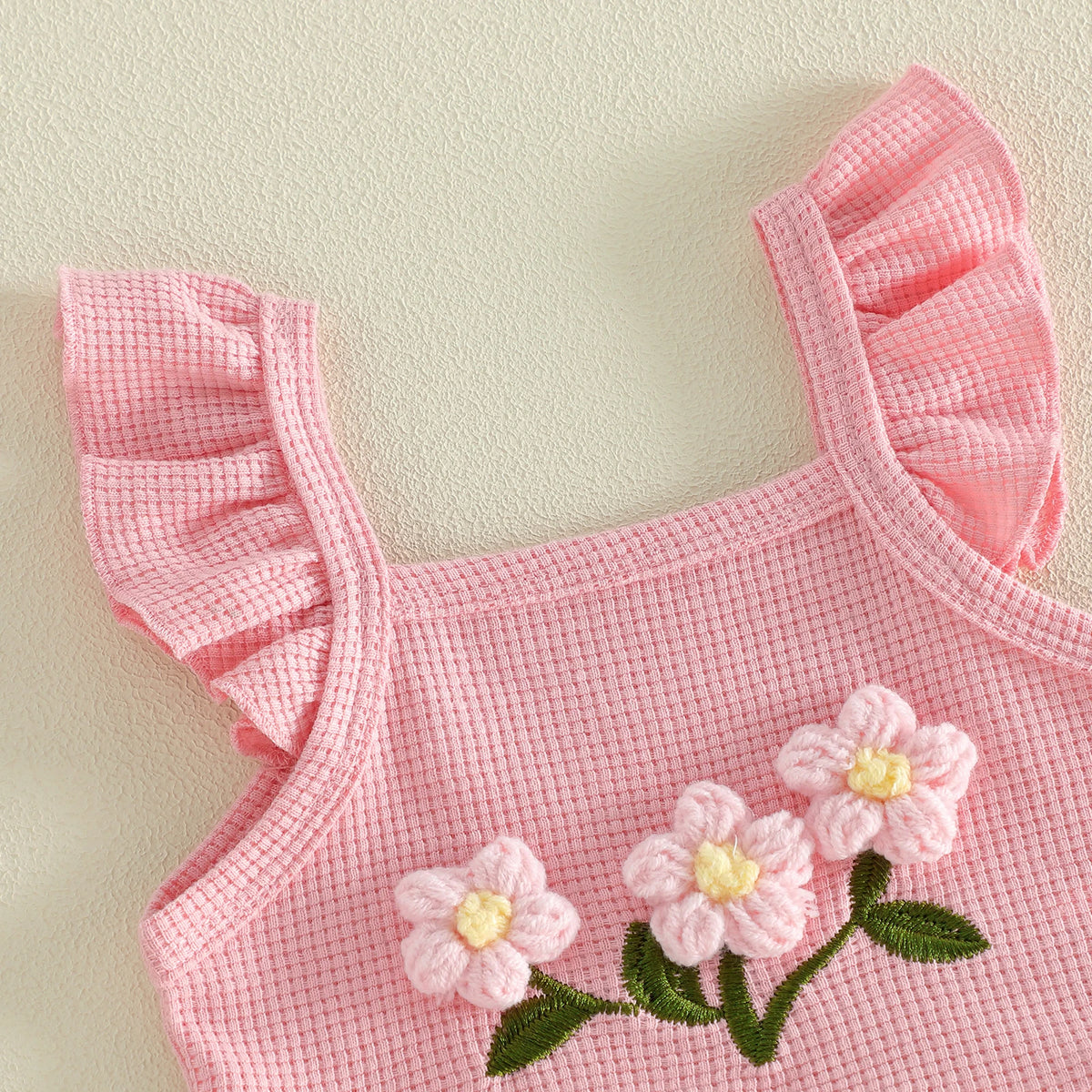 baby girl pink textured top age 0 to 6 months with ruffled sleeves and floral embroidery