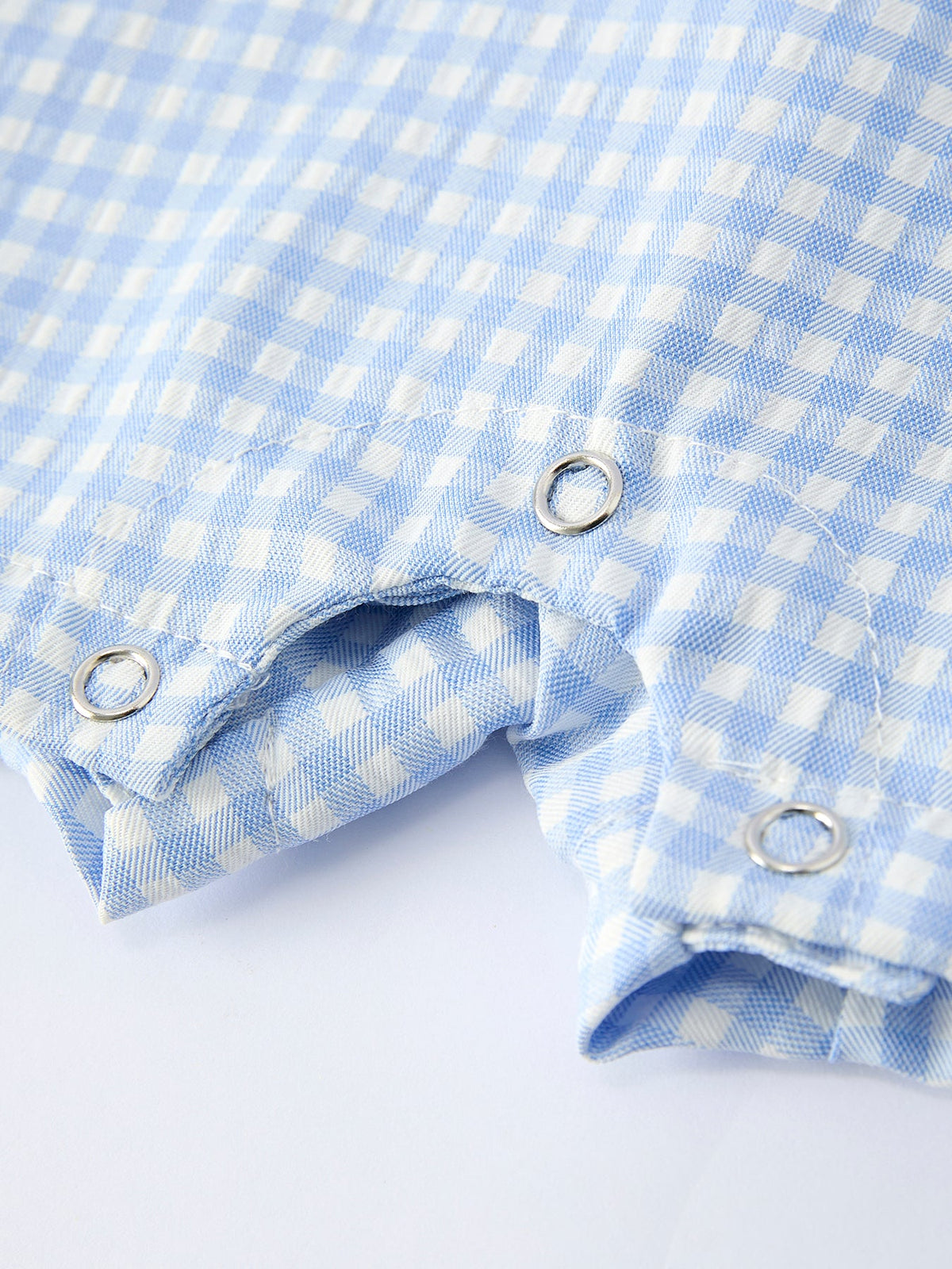 Rylee Faith Designs baby boys crocodile smocked romper in blue gingham with snap closures for easy diaper changes
