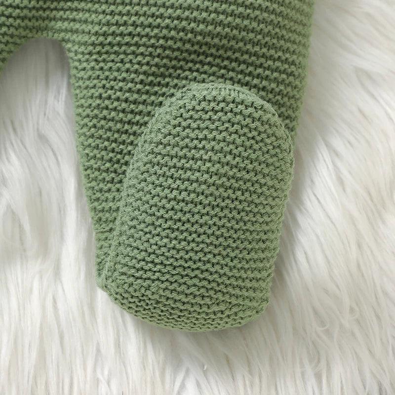 Green knit baby cardigan and overalls outfit with textured knit and footed design for infants