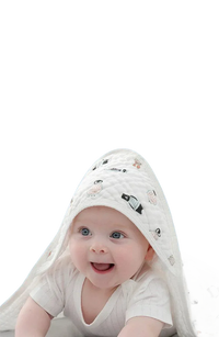 White baby envelope wrap with cute animal print for newborns, soft and cozy fabric