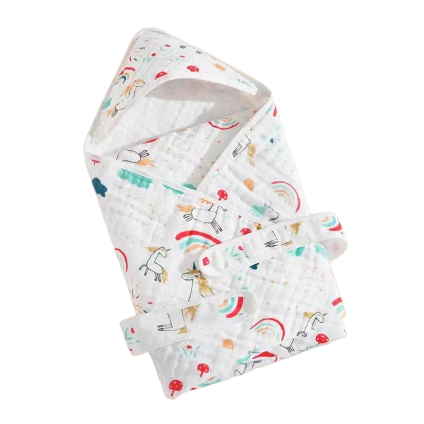 White baby envelope wrap for newborns with colorful unicorn and rainbow print