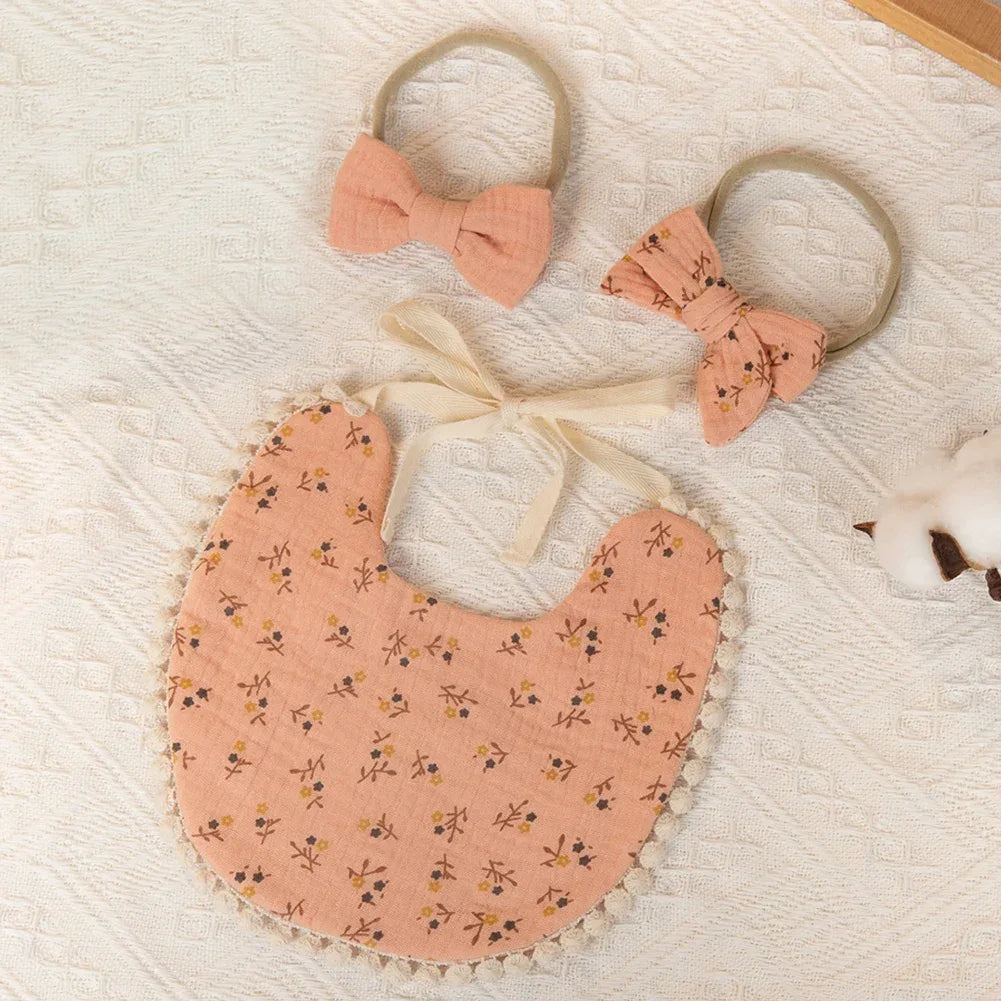 Pink baby flower bib and headband set with floral print and bow for newborns