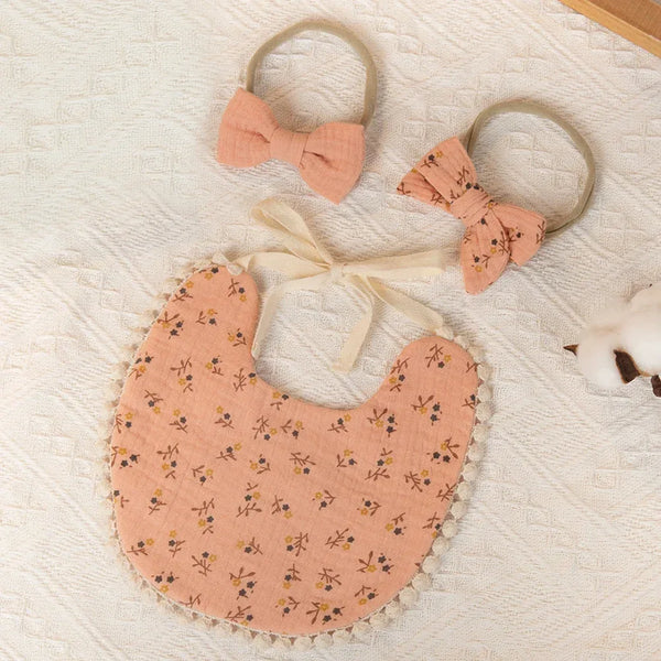 Pink baby flower bib and headband set with floral print and bow for newborns