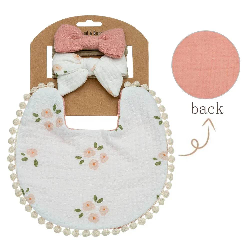 white baby flower bib and headband set with peach floral print and lace trim for infants