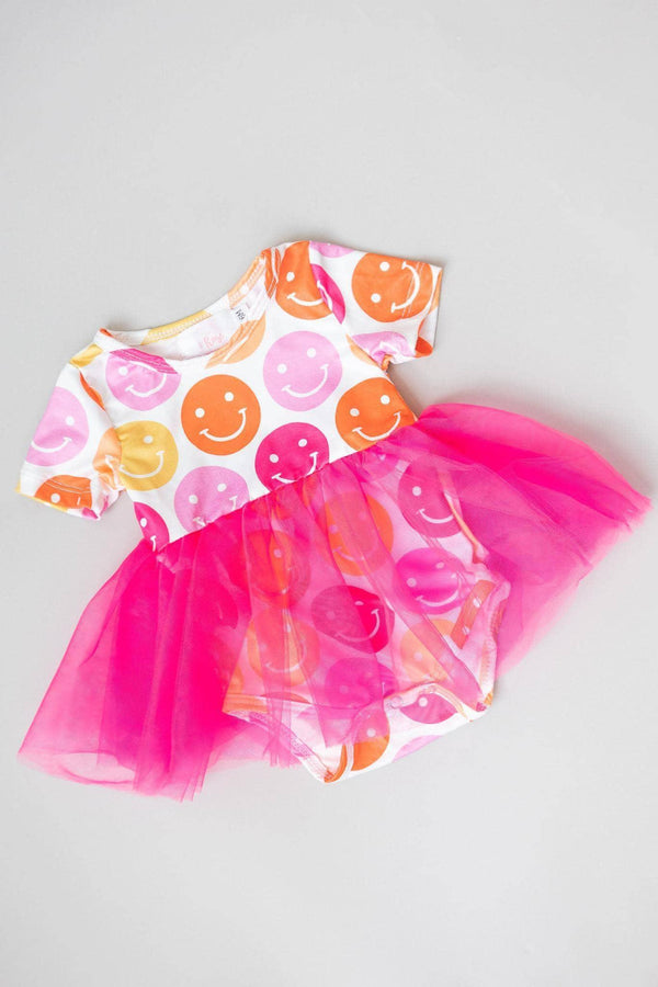 Colorful baby girl tutu bodysuit with smiley face print and bright pink tulle skirt for infants