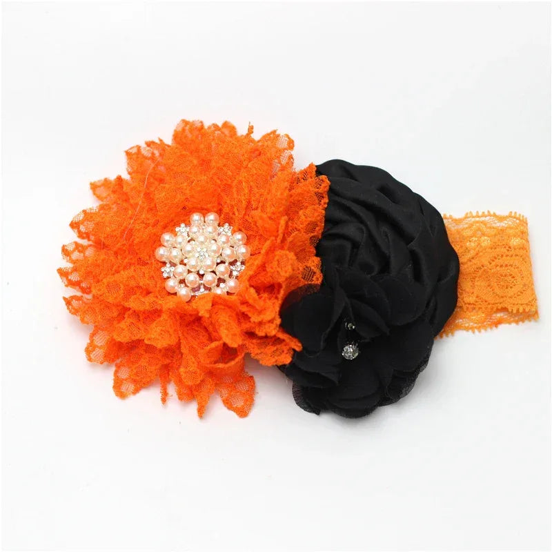 Orange lace headband with large orange and black flower and pearl center baby hair accessories
