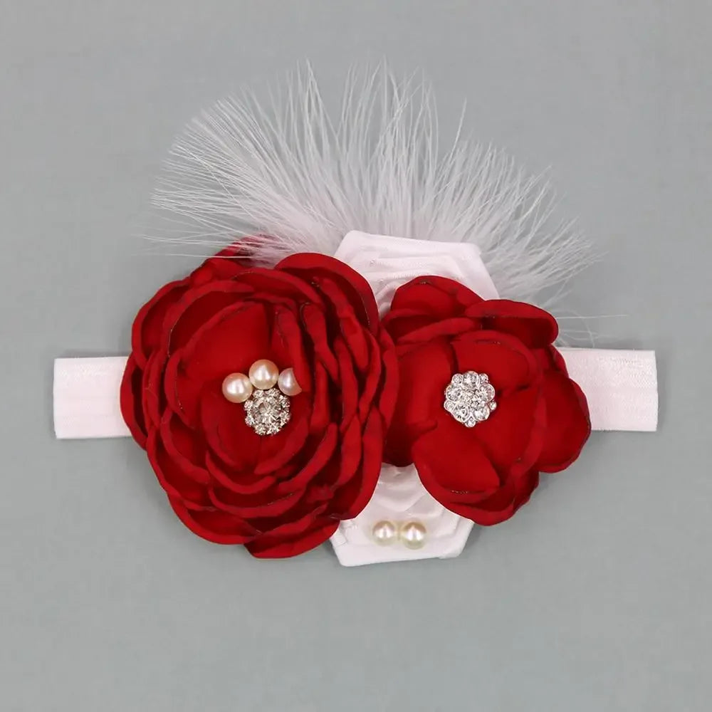 baby white headband with red fabric flower headpieces and pearl rhinestone embellishments