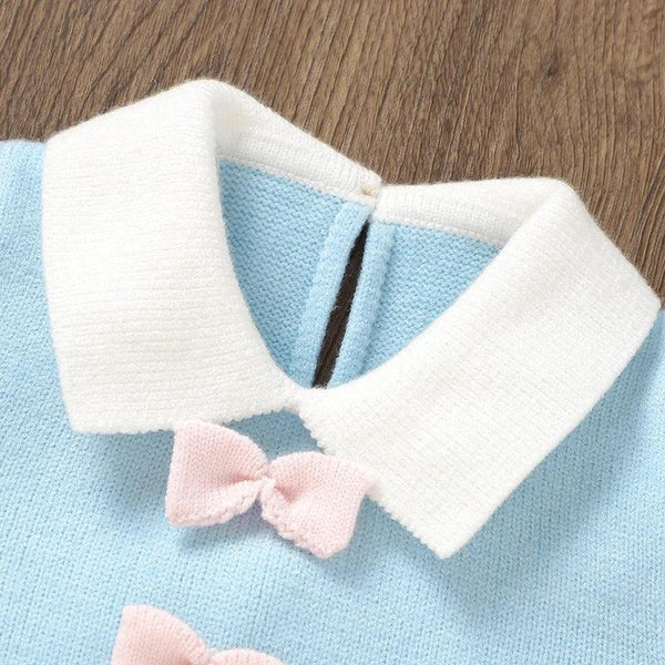 baby blue knit dress with white collar and pink bow detail for infants