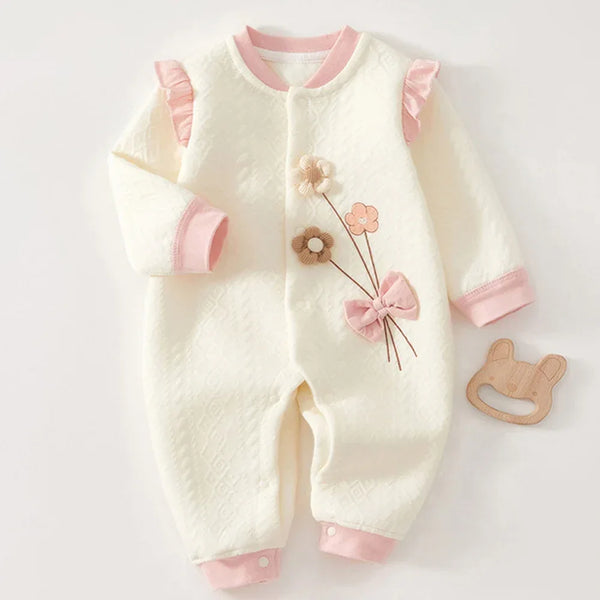 White and pink baby knitted flower romper made of soft knit fabric with floral embroidery and ruffle details