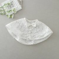 white baby lace special occasion dress cape with bow and pearl button details for infants