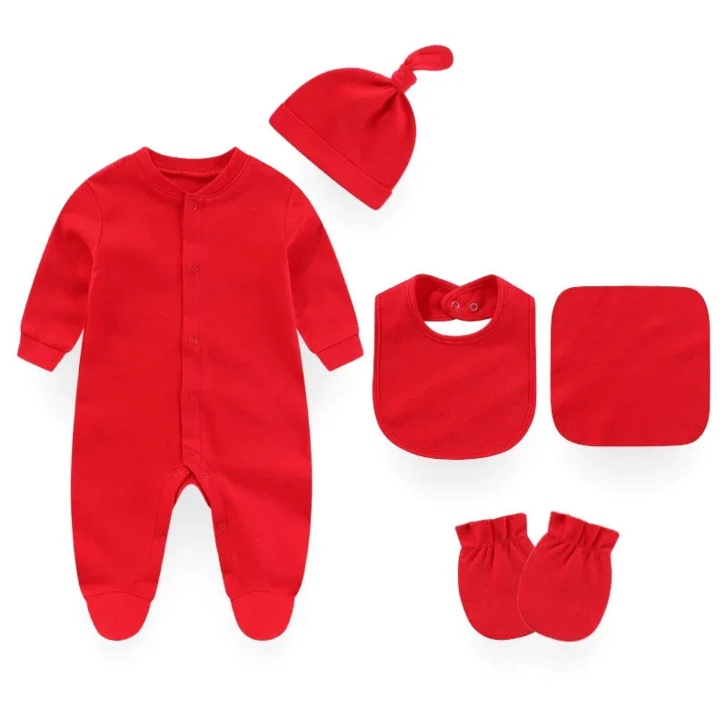 Red baby layette set with footed sleeper, knotted hat, bib, mittens, and washcloth for newborns