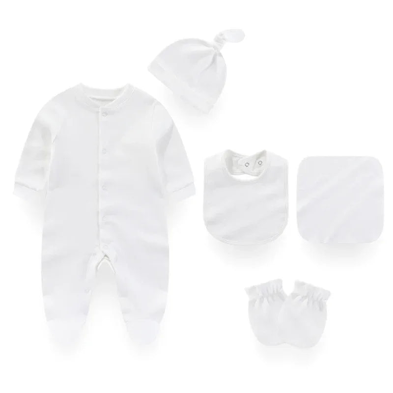 White baby layette set with long sleeve footed sleeper, hat, bib, mittens, and washcloth for newborns