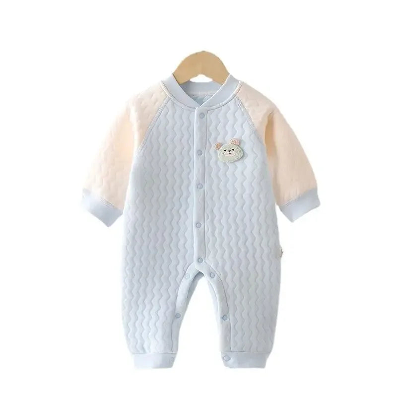 Light blue and beige cotton baby quilted romper with wave pattern and bear patch