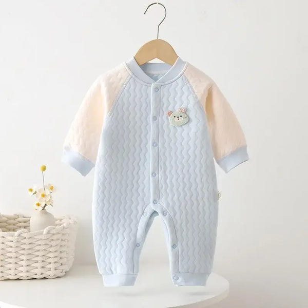 Light blue and cream baby quilted romper made of soft cotton with animal patch on chest
