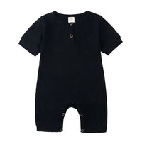 black baby romper for infants with short sleeves and snap buttons for easy diaper changes