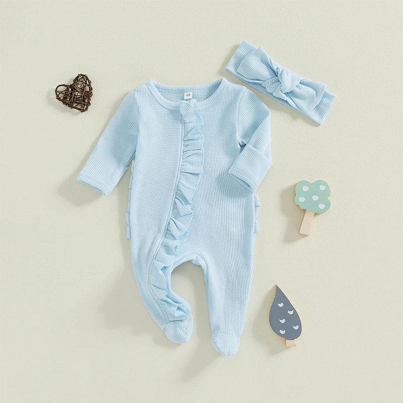 Baby blue romper with ruffle detail and matching headband for infants