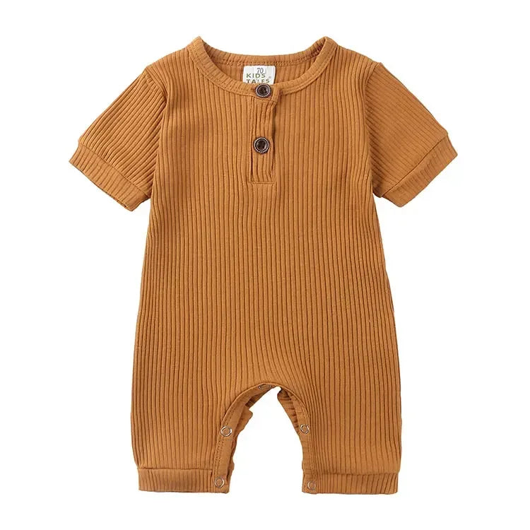 tan ribbed baby romper with short sleeves and button details for infants