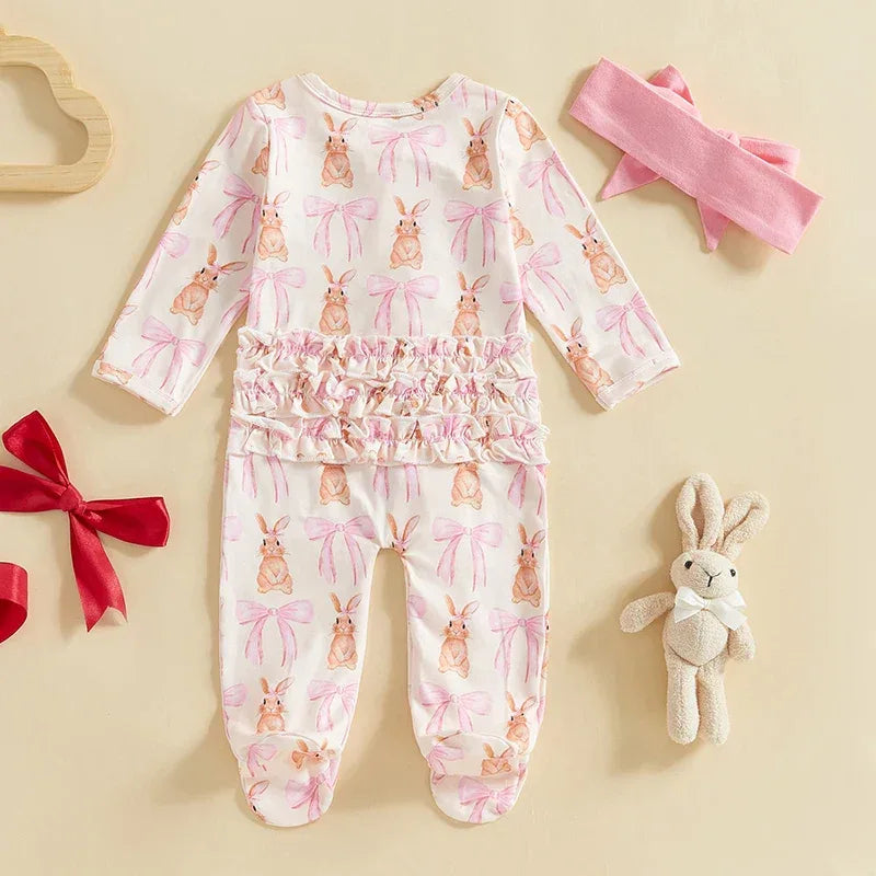 baby romper with long sleeves in white featuring pink bows and bunny prints for infants