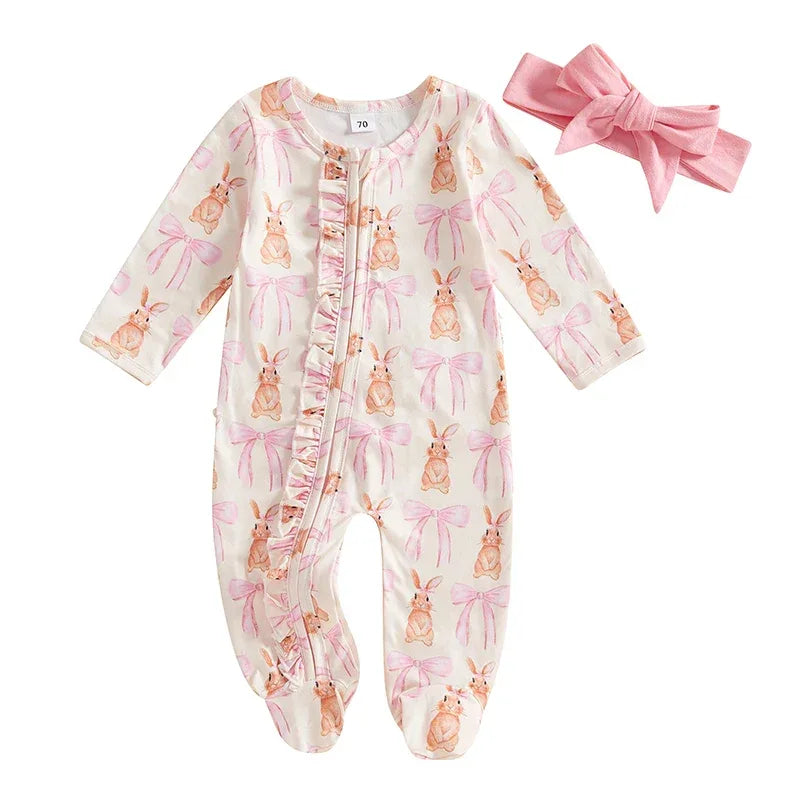 Pink and white baby romper with bunny and bow print, long sleeve, footed, and matching pink headband