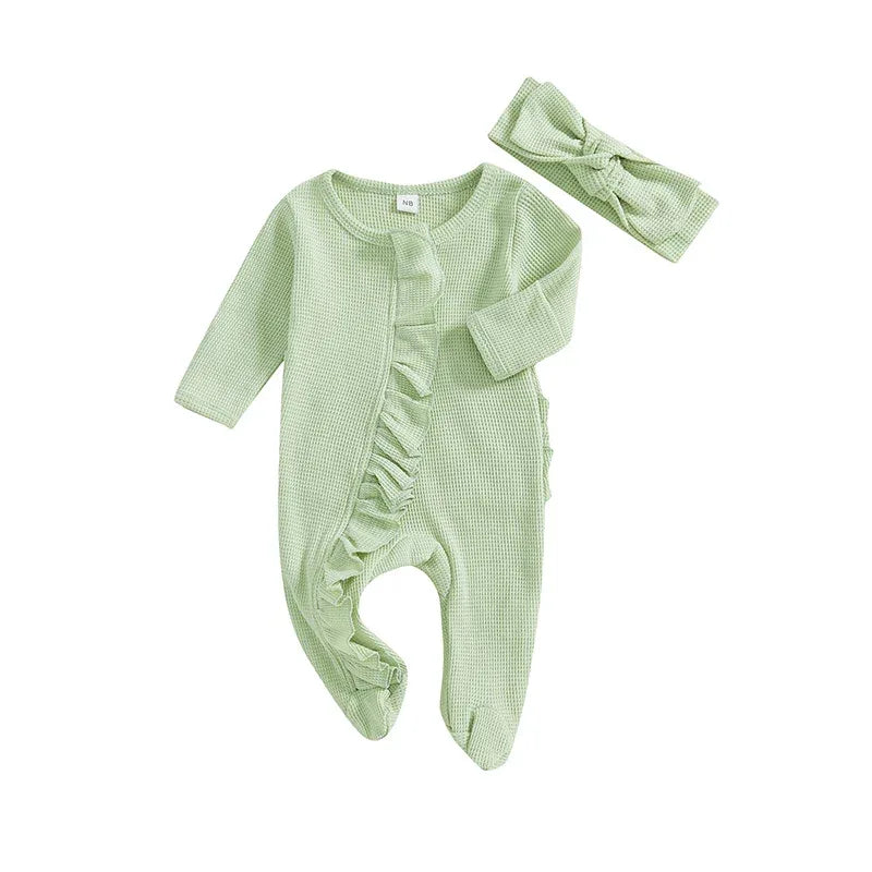 baby green waffle knit romper with ruffle detail and matching headband