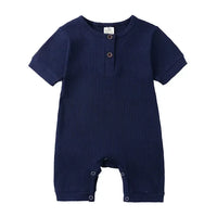 navy blue baby romper with short sleeves and button detail for infants