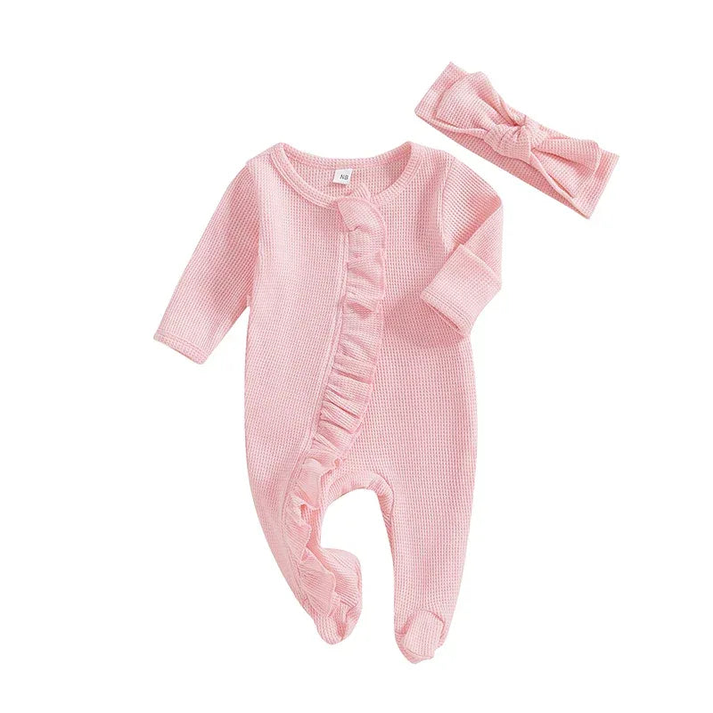 baby girls pink romper with ruffle detail and matching headband long sleeve