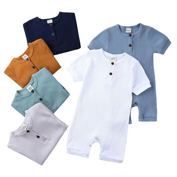 Baby romper set with short sleeves in white, blue, navy, mustard, teal, and gray ribbed fabric