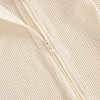 cream baby romper set with hat in waffle knit fabric, newborn size zipper detail