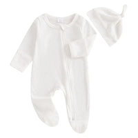 White baby romper set with hat in soft ribbed fabric, newborn size with long sleeves and footed legs
