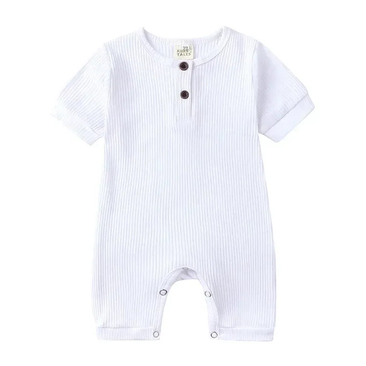 white baby romper for infants short sleeve with button detail and snap closures