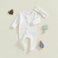 white baby romper with long sleeves and ruffle detail with matching white headband