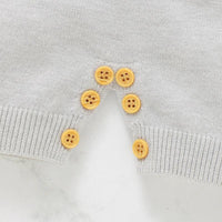 baby gray short sleeve romper with yellow buttons for easy diaper changes