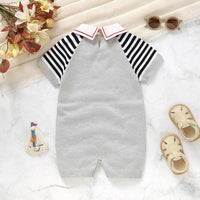 baby gray short sleeve romper with navy striped sleeves and white collar toddler clothing