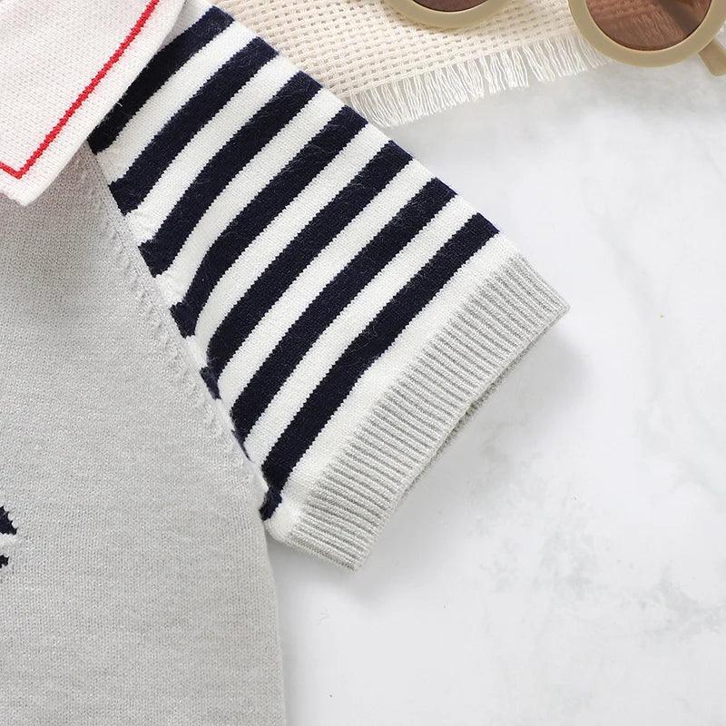 babies short sleeve romper with navy and white striped sleeves in size suitable for infants