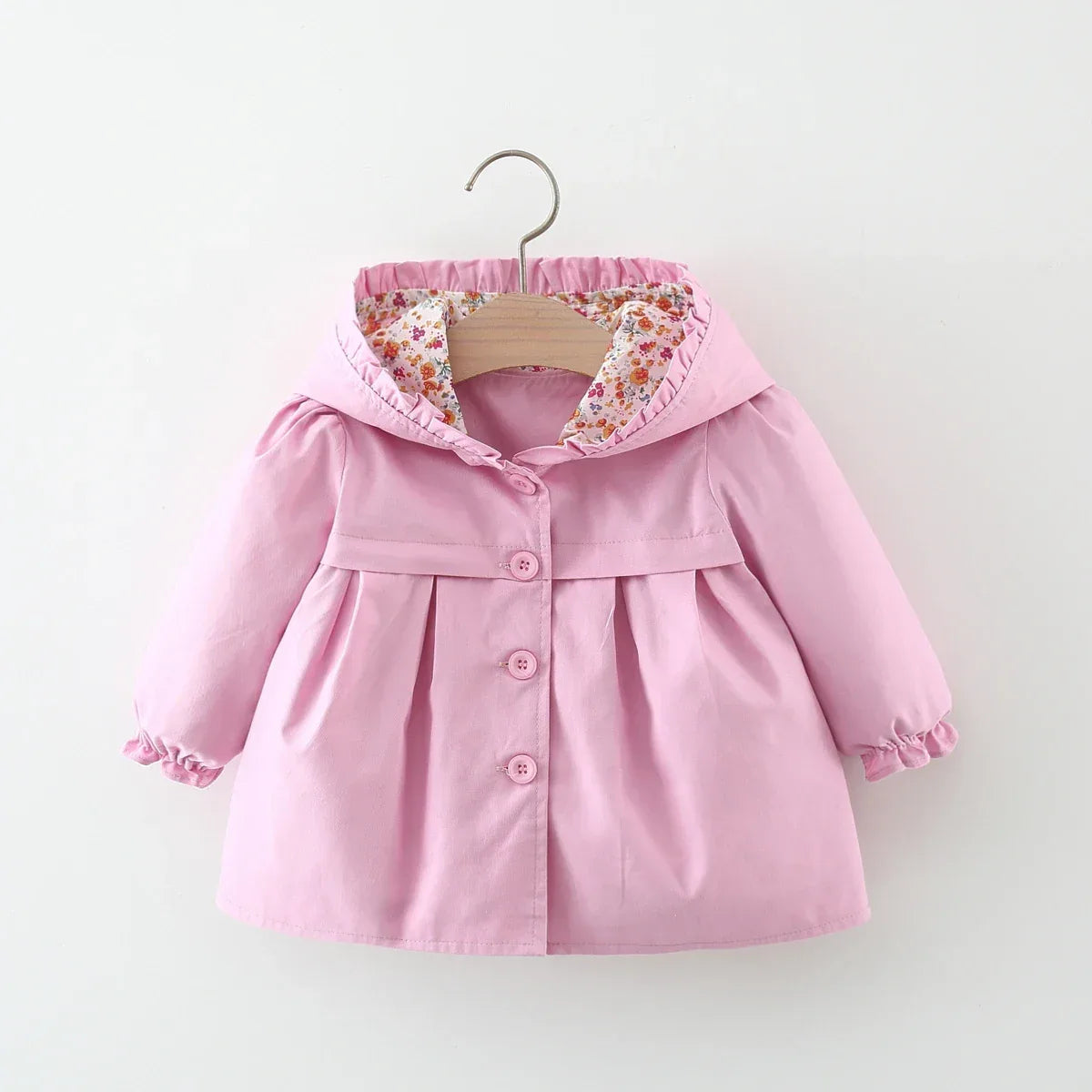 baby pink spring coat with floral hood lining and ruffle cuffs for infants