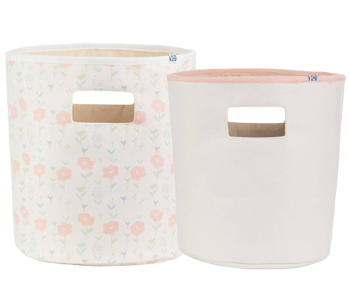 Set of two pastel floral and light pink cotton baby storage bins for nursery with built-in handles
