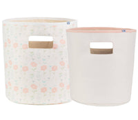 Set of two pastel floral and light pink cotton baby storage bins for nursery with built-in handles
