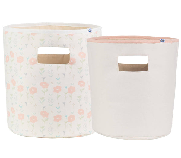 Set of two pastel floral and light pink cotton baby storage bins for nursery with built-in handles