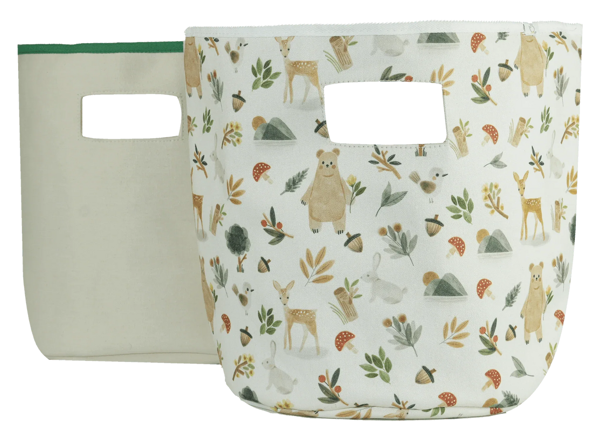 Set of two baby storage bins with woodland animal and leaf patterns in soft neutral colors