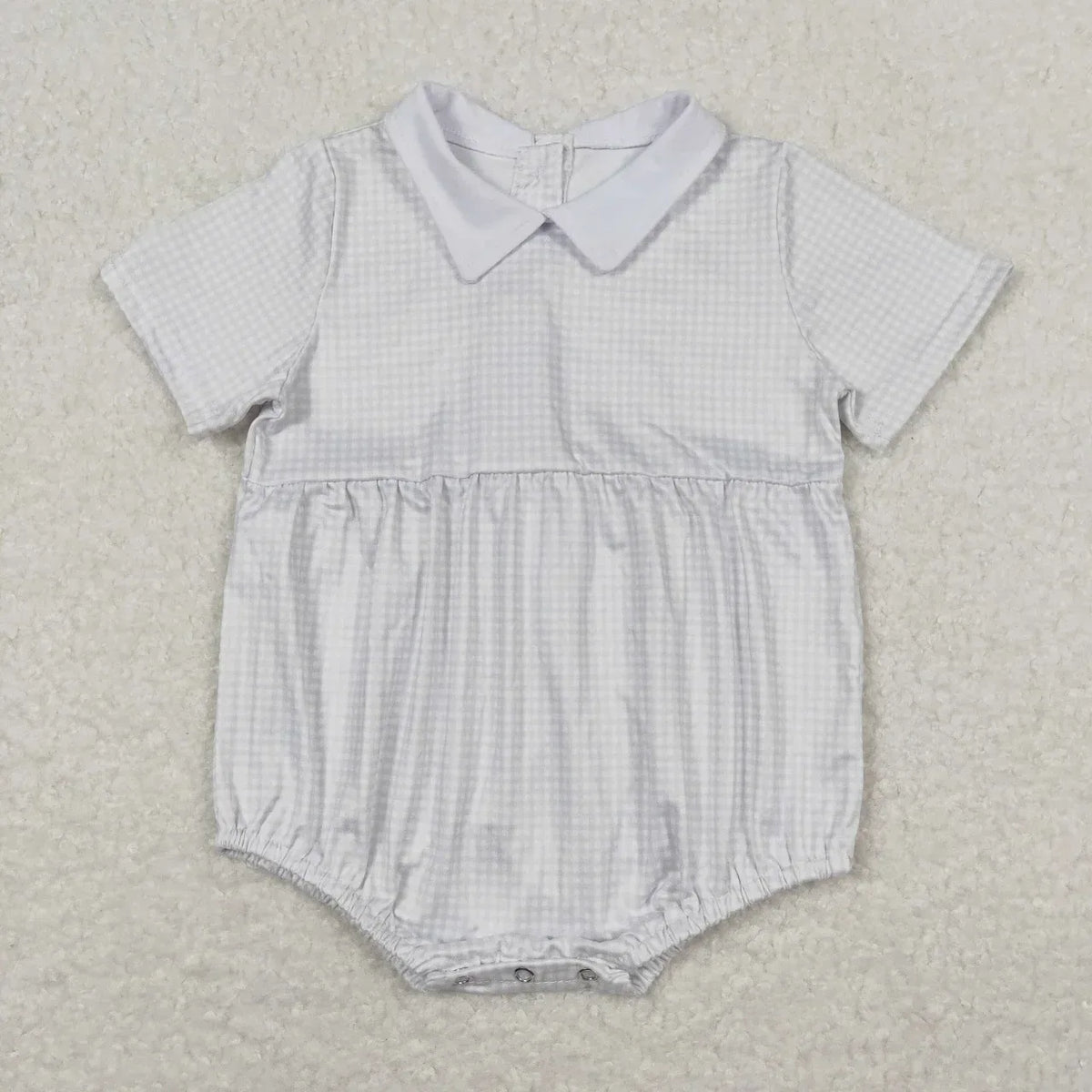 White and gray checkered baby summer rompers with short sleeves and a Peter Pan collar for infants