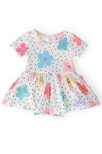 White baby twirl bodysuit dress with colorful flowers and black polka dots for infants