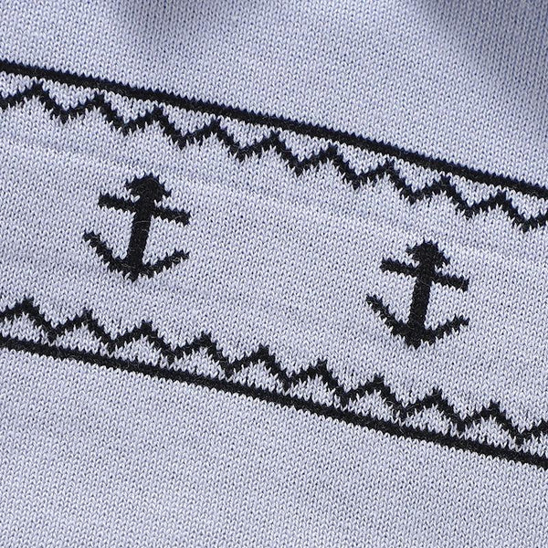Light blue nautical baby romper for infants with black anchor pattern detail