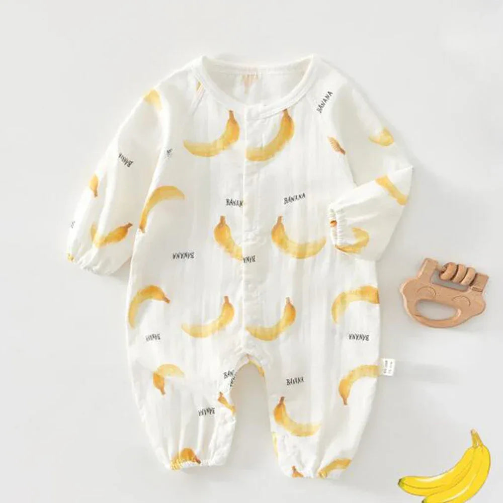 White cotton fruit print baby romper with yellow banana patterns and long sleeves