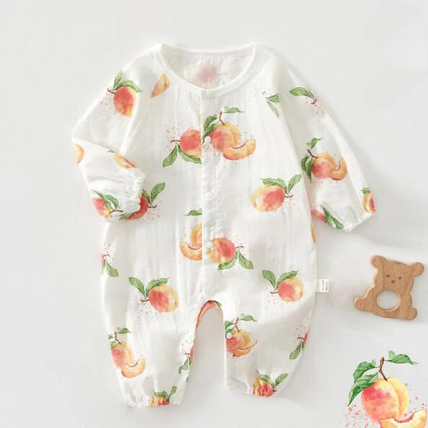 White cotton fruit print baby romper with peach designs and long sleeves for infants