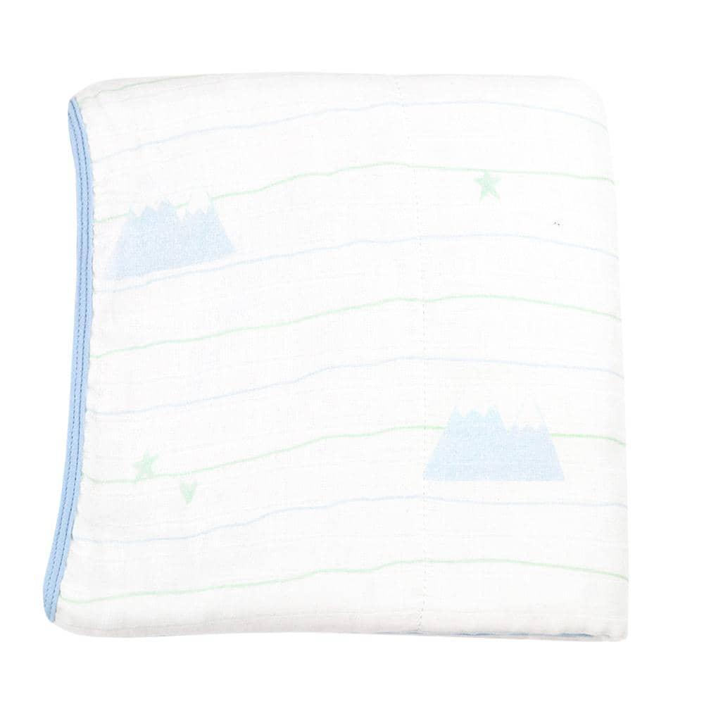 Folded white bamboo muslin baby blanket with blue trim and light mountain pattern for newborns