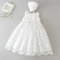 White baptism dress for baby girl with floral lace overlay and matching bonnet
