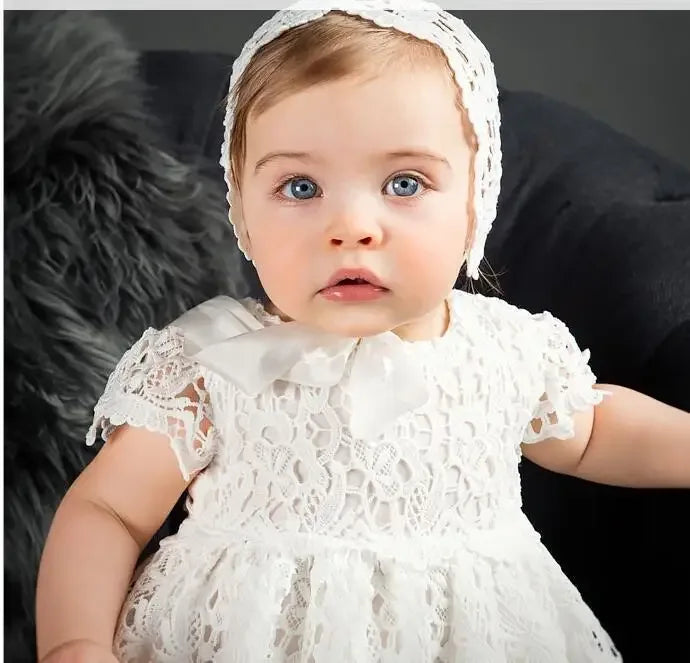 white lace baptism gown for baby with short sleeves and matching bonnet